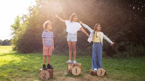Three children enjoying a Summer of Play at Seaton Delaval Hall, Northumberland